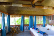 Fidji - Iles Mamanuca - Beachcomber Island Resort - Beachfront Bure © Chris McLennan
